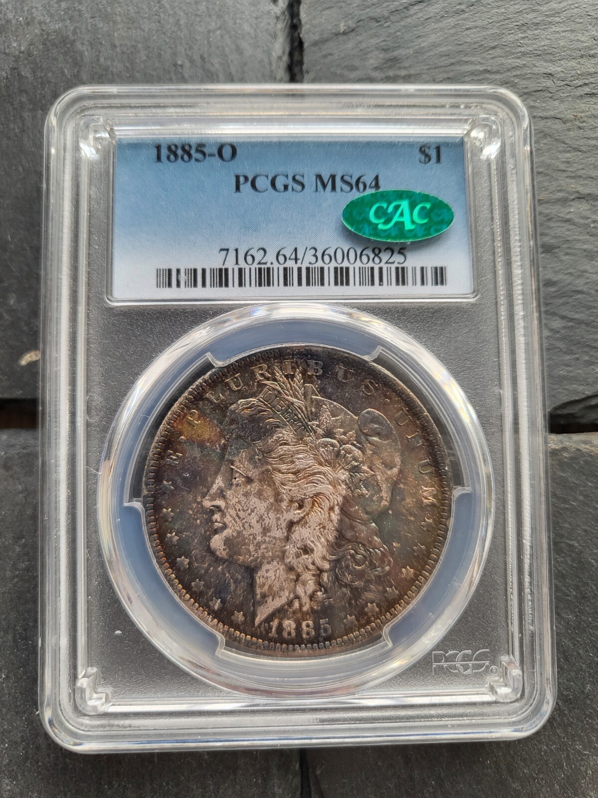 1885 O Morgan Silver Dollar PCGS MS64 (CAC) toned