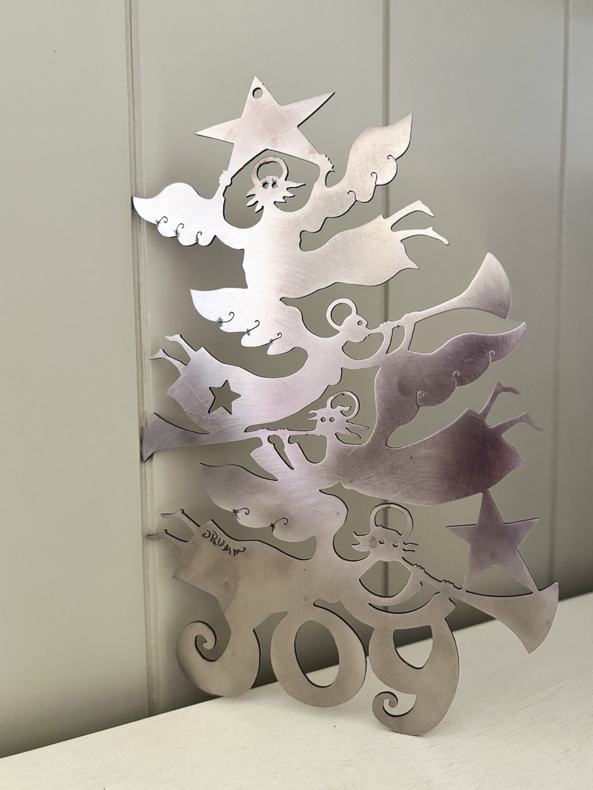 Vtg Don Drumm Signed Aluminum Laser Cut Christmas Ornament “Joy” Angels Trumpets Vtg Don Drumm Signed Aluminum Laser Cut Christmas Ornament “Joy” Angels Trumpets