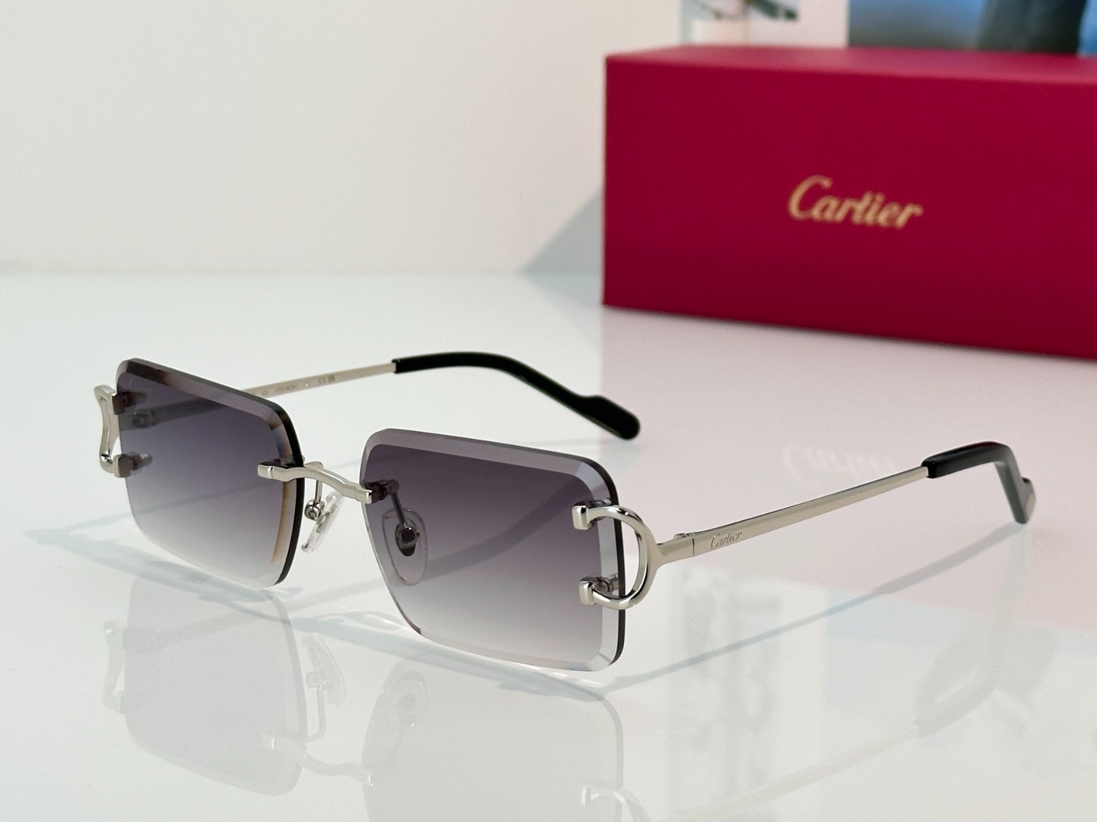 CARTIER CT1828O Rimless Rectangle Sunglasses Silver Frame Gray Gradient Lenses CARTIER CT1828O Rimless Rectangle Sunglasses Silver Frame Gray Gradient Lenses