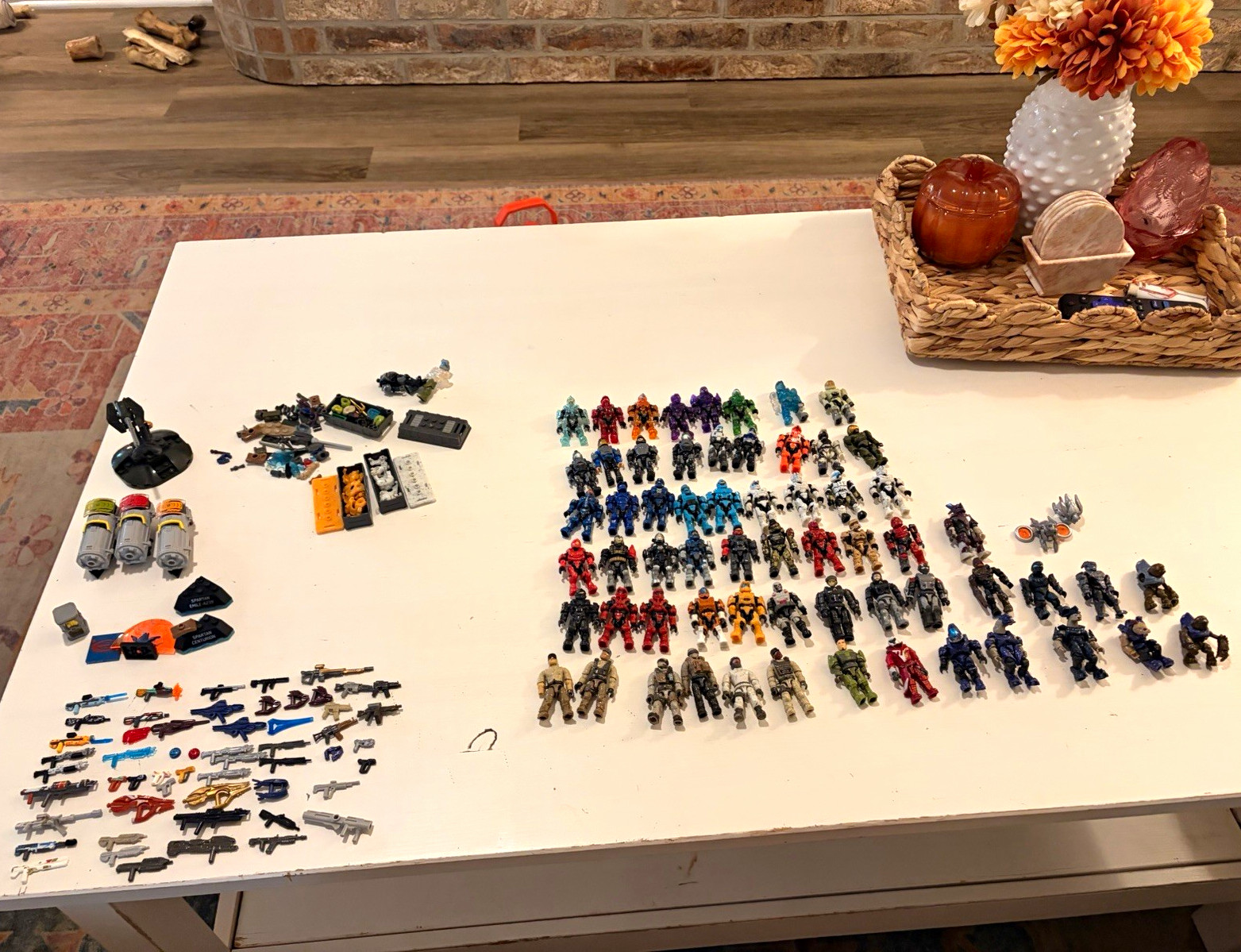 Mega Bloks lot of 64 mini figures, weapons, ships, and miscellaneous items.