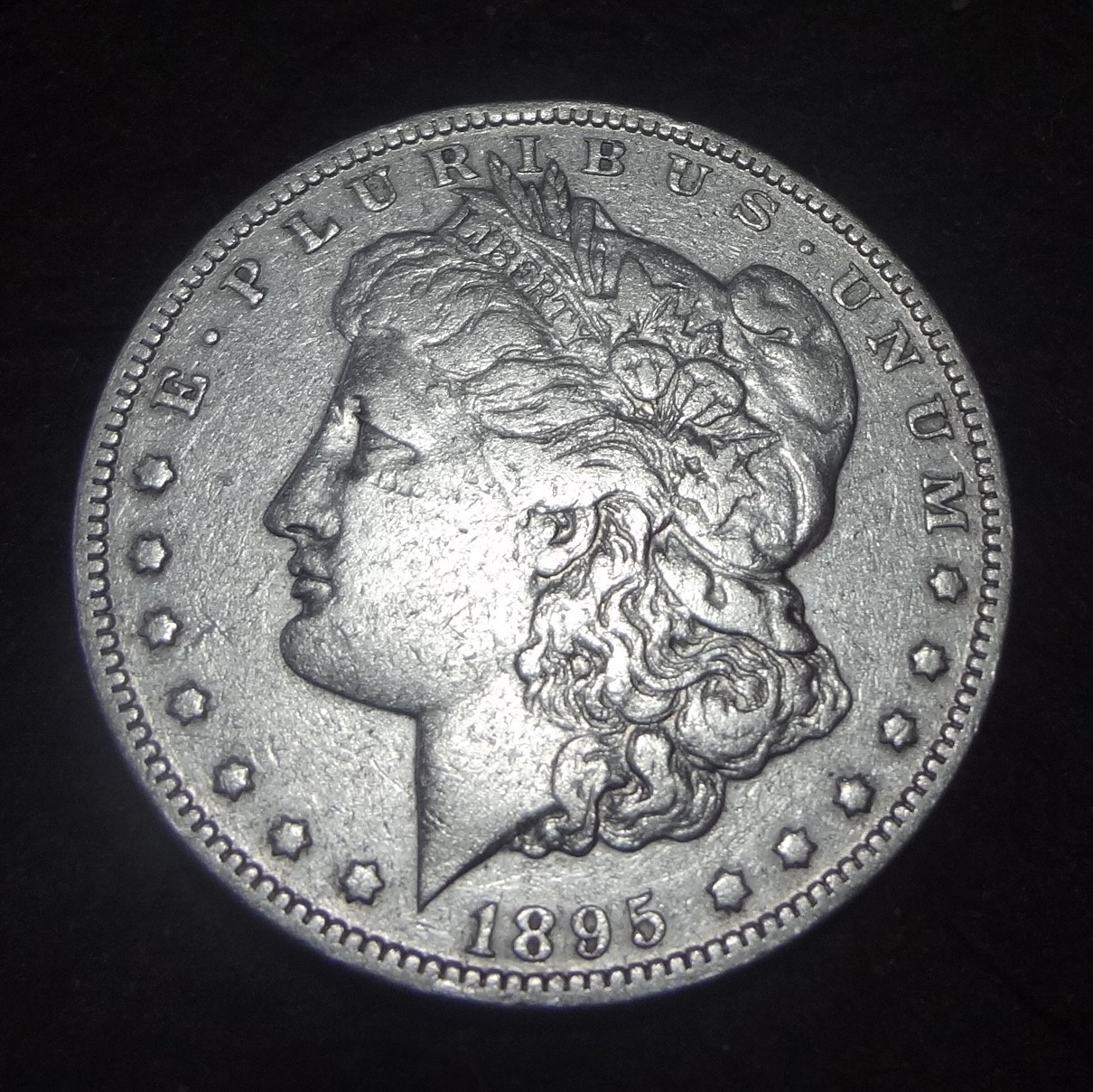 1895-O Morgan Silver Dollar -Solid VF details key from the New Orleans mint