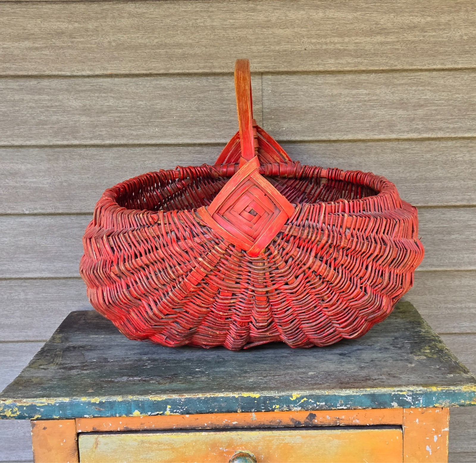 ANTIQUE PRIMITIVE VERY LARGE WICKER BASKET IN ORIGINAL RED PAINTED SURFACE