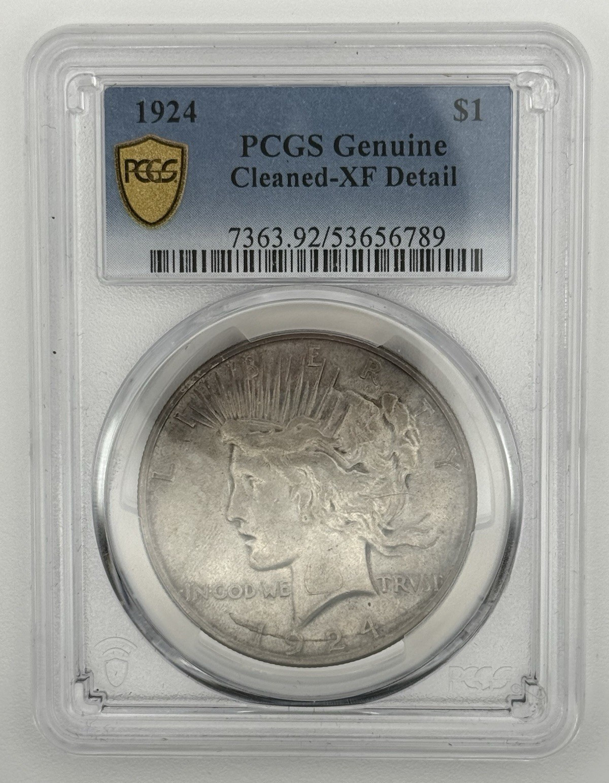 1924-P Peace Dollar $1 Coin — PCGS Graded as Genuine Cleaned-XF Detail