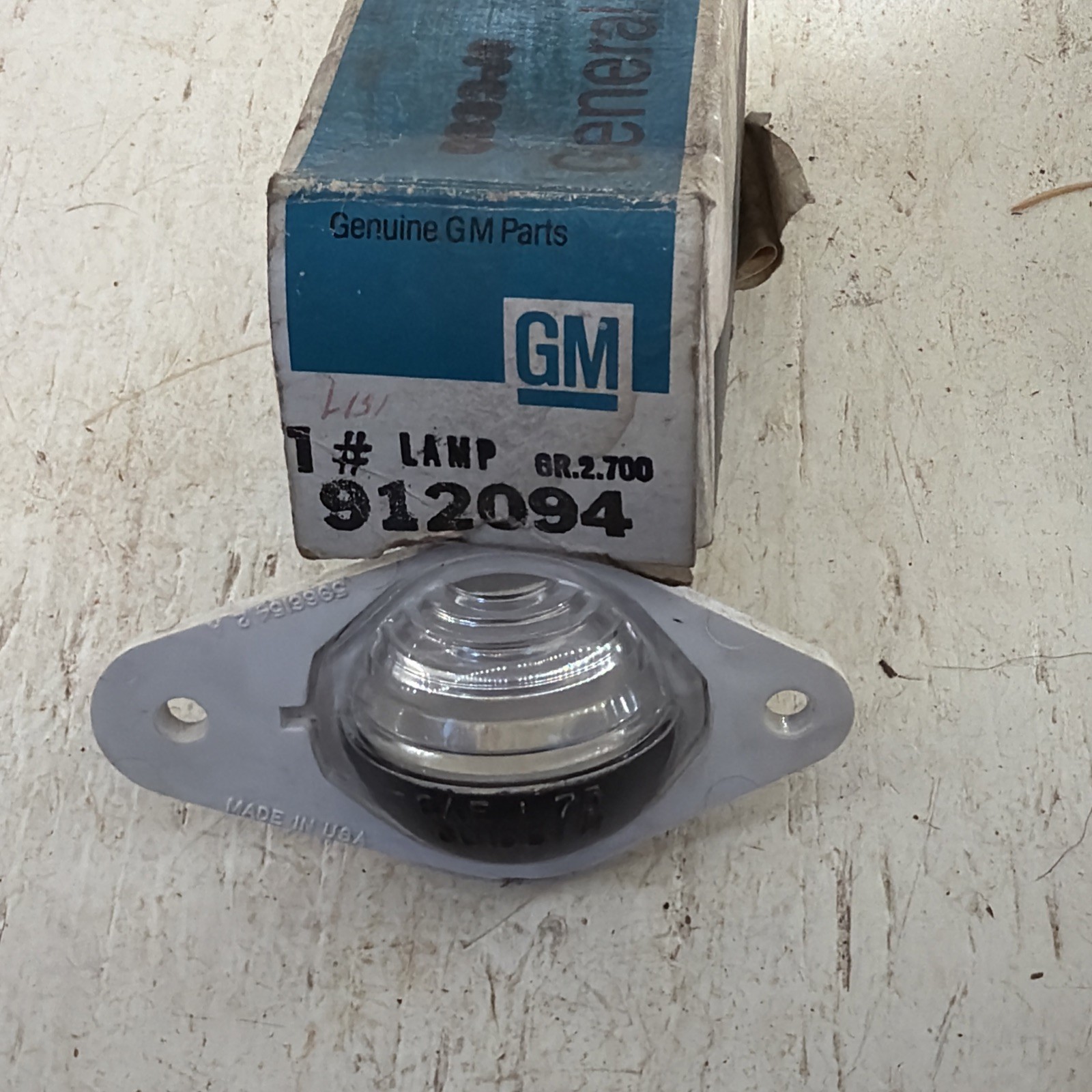 NOS OEM Gm 912094 License Plate Lamp Assembly 1975 Nova Apollo Skylark Omega New