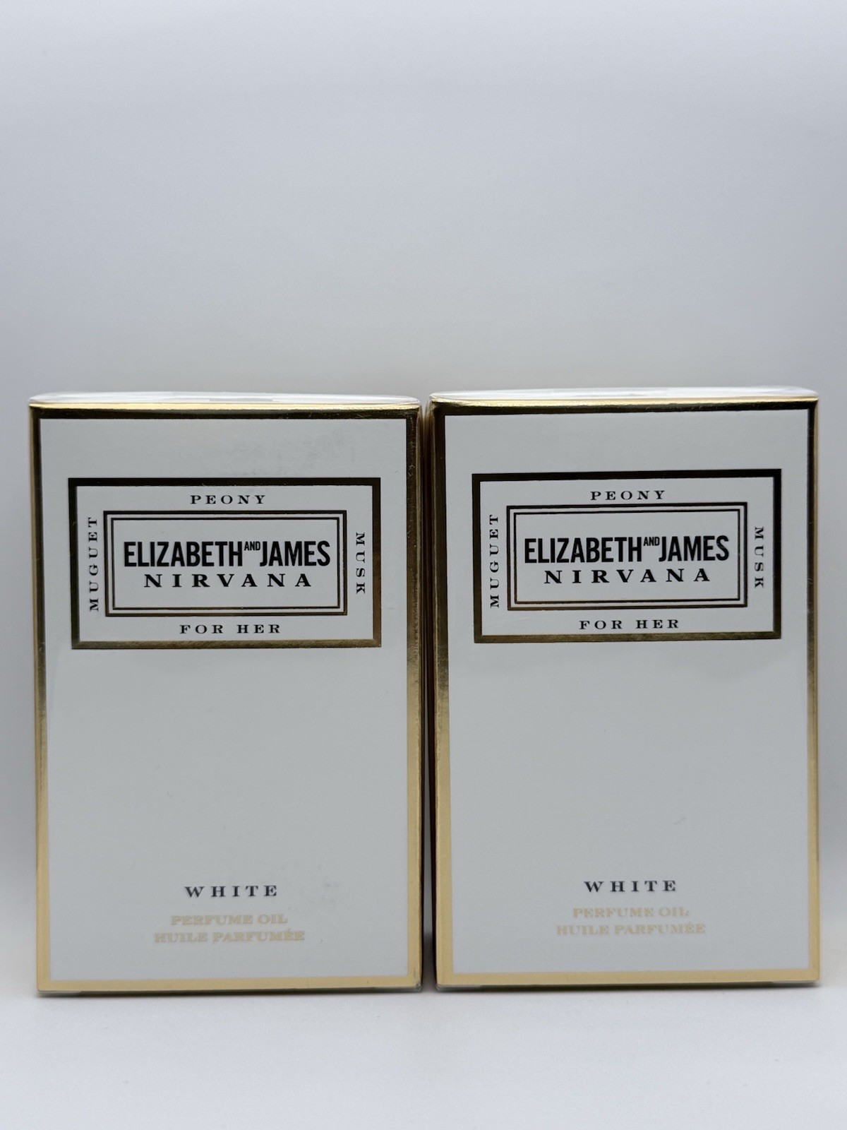 Elizabeth & James ~ Nirvana White ~ 0.47 oz perfume oil NEW SEALED Pack Of Two Elizabeth & James ~ Nirvana White ~ 0.47 oz perfume oil NEW SEALED Pack Of Two