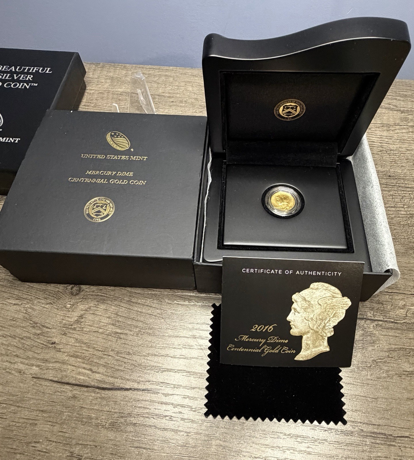 2016-W 1/10th oz Gold Mercury Dime Centennial (Complete OGP) 2016-W 1/10th oz Gold Mercury Dime Centennial (Complete OGP)