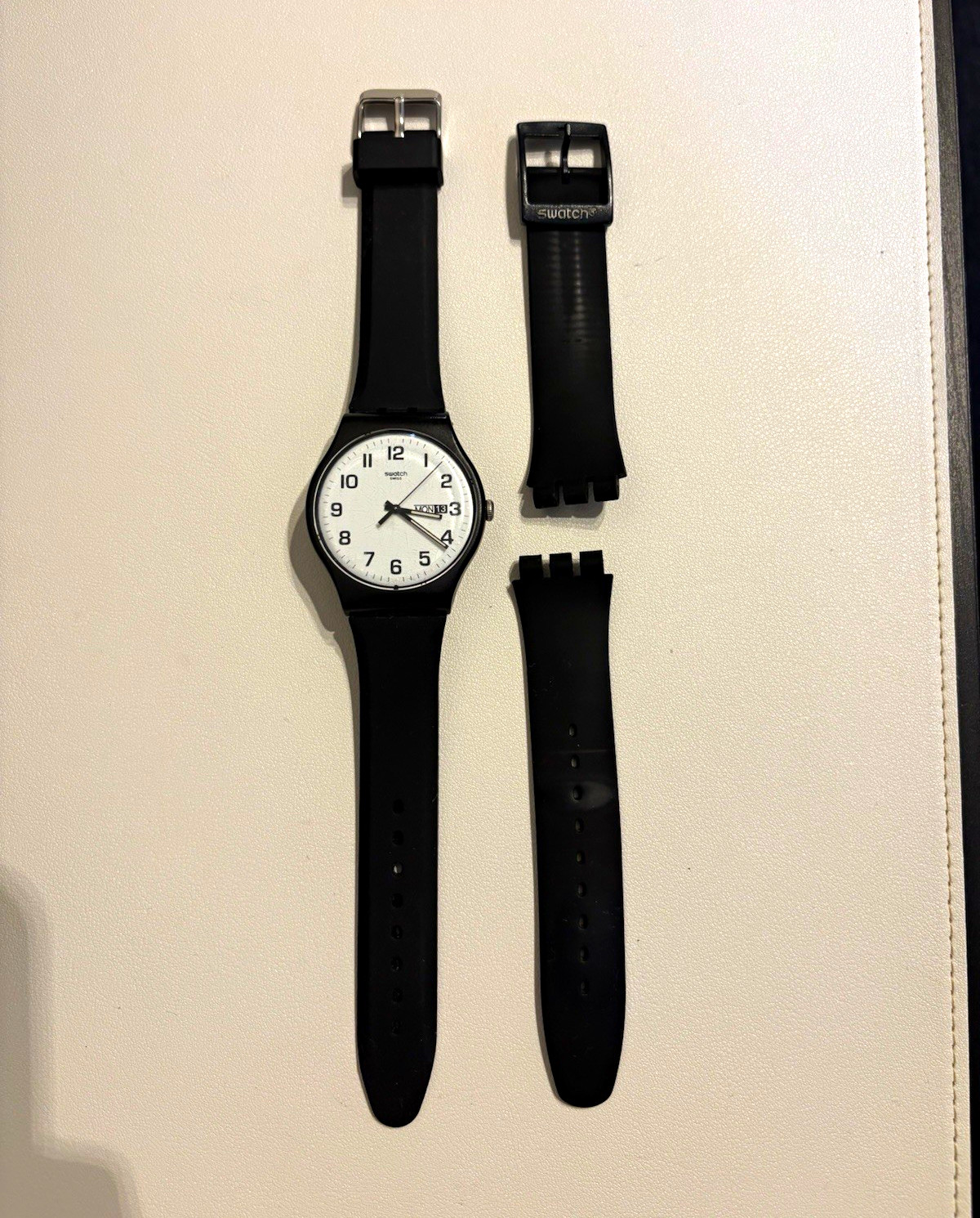 Swatch Swiss Made Quartz Wristwatch Black Plastic Case White Dial Day/Date Swatch Swiss Made Quartz Wristwatch Black Plastic Case White Dial Day/Date