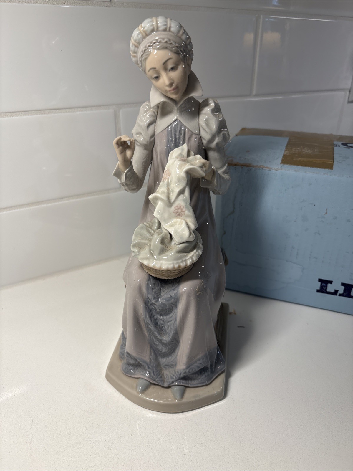 Lladro #5126 SEWING A TROUSSEAU 11 1/2 Lladro #5126 SEWING A TROUSSEAU 11 1/2