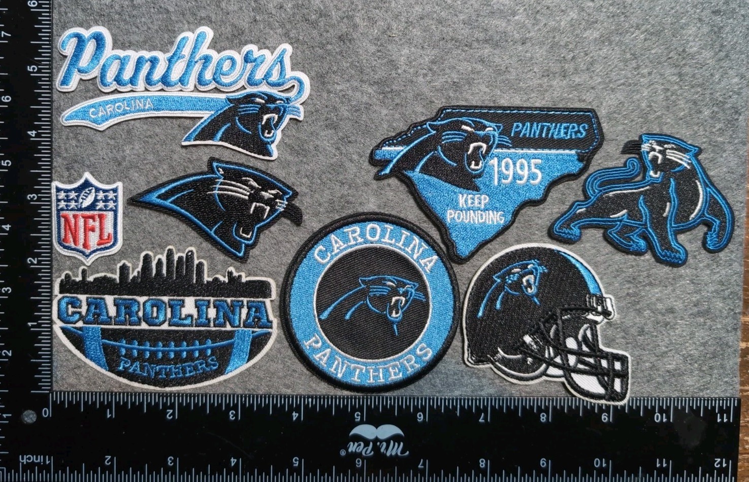 LOT OF 8 CAROLINA  PANTHERS IRON ON EMBROIDERED PATCHES  GET EVERYTHING IN PHOTO