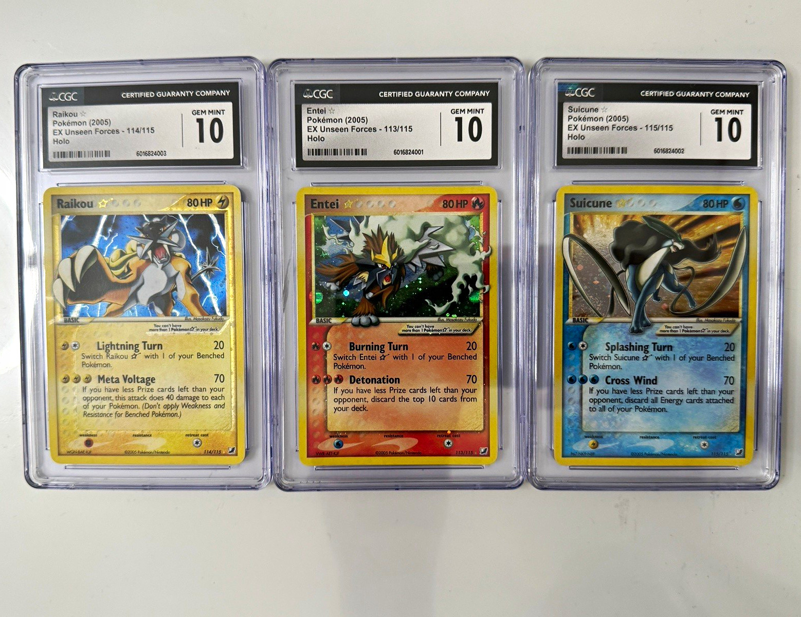 CGC 10 Gem Mint Pokemon 2005 EX Unseen Forces Holo Entei/Raikou/Suicune