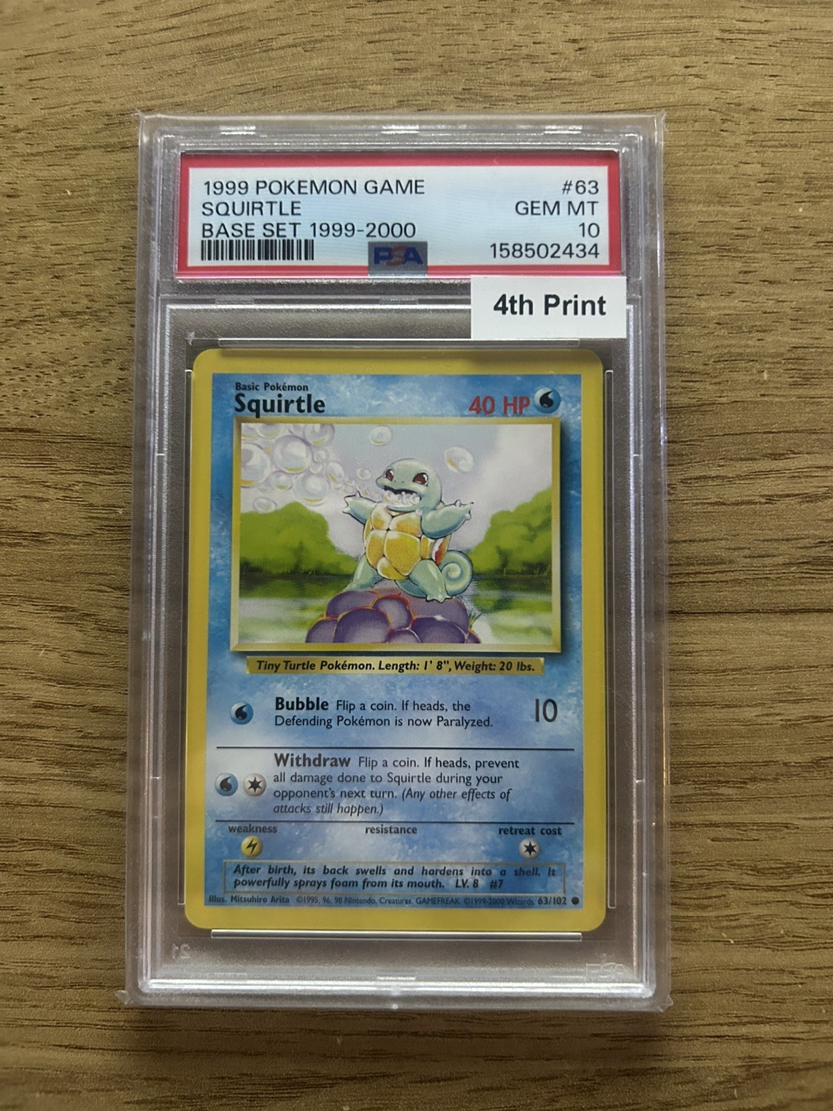 PSA 10 Squirtle 63/102 Base Set 1999-2000 4th Print Pokemon Card - Gem Mint PSA 10 Squirtle 63/102 Base Set 1999-2000 4th Print Pokemon Card - Gem Mint