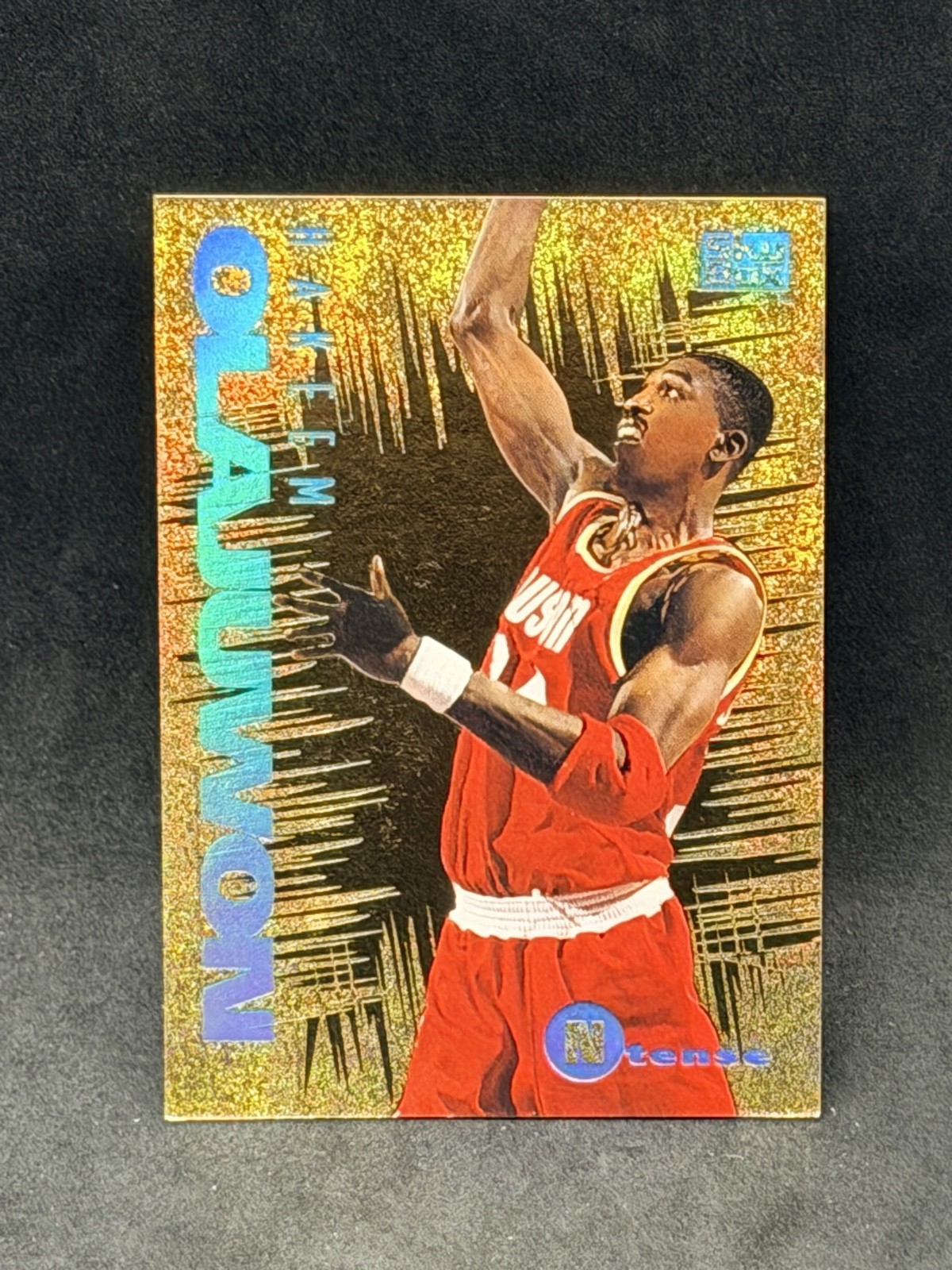 1994-95 Skybox Emotion - Ntense Hakeem Olajuwon #8 Houston Rockets MVP HOF