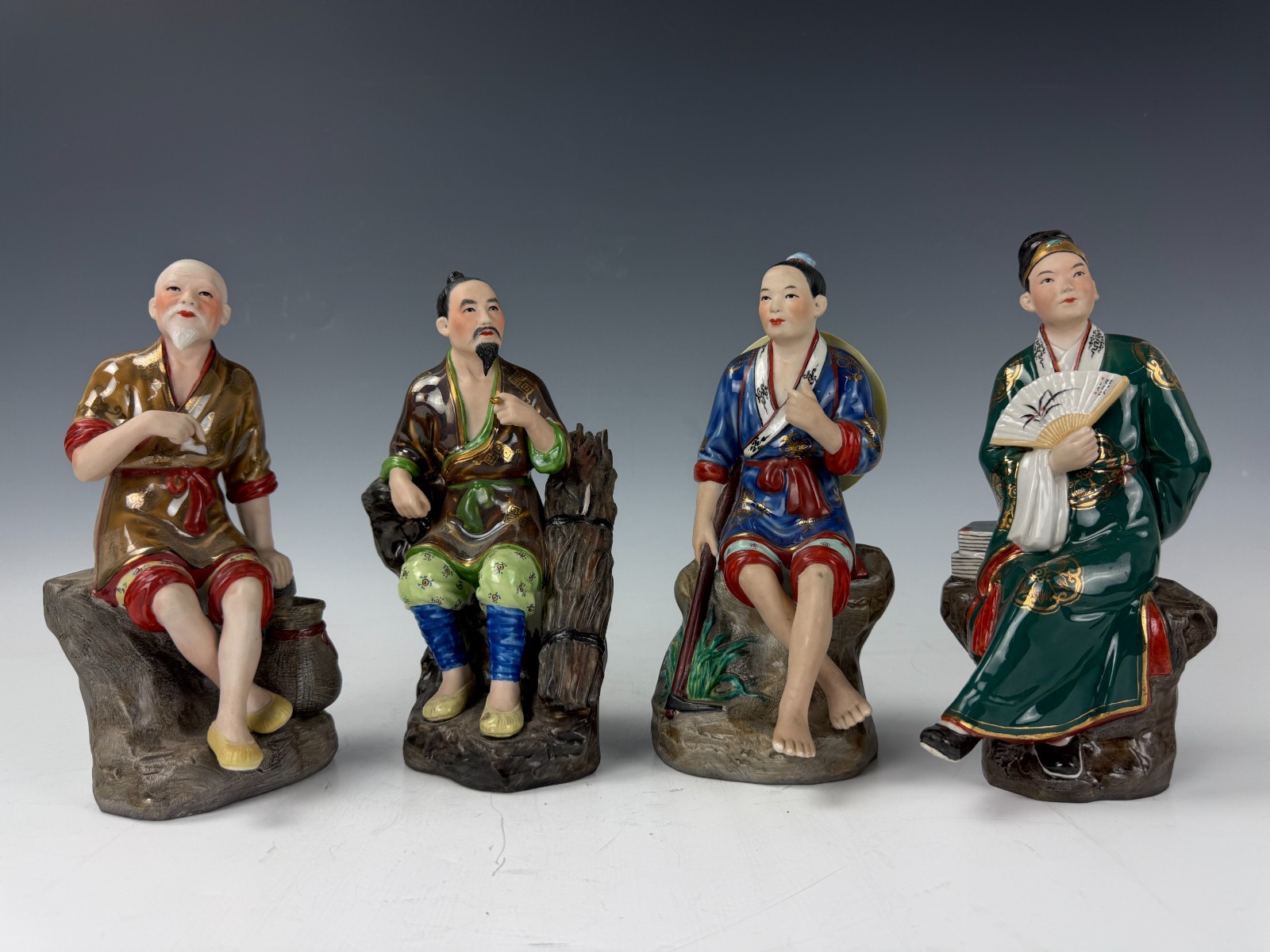 A Group of Vantage Chinese Porcelain Figures for Four Occupations