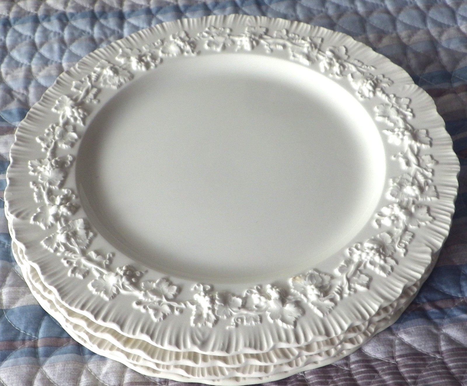 THREE WEDGWOOD EMBOSSED QUEENSWARE CREAM COLOR DINNER PLATES UNUSED