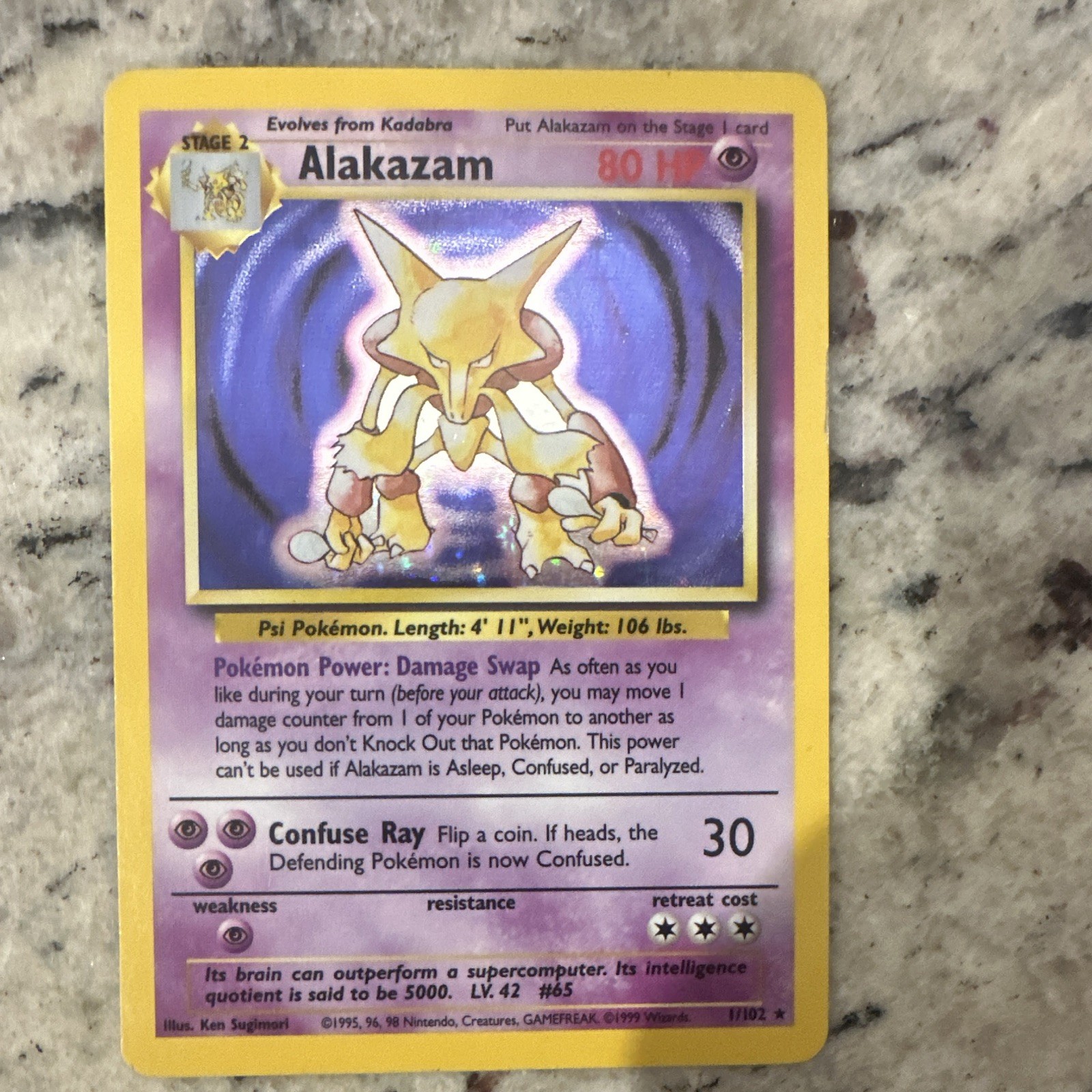 Wizards of the Coast Alakazam 1/102 Base Set Holo Rare Unlimited Eng 1999 80HP Wizards of the Coast Alakazam 1/102 Base Set Holo Rare Unlimited Eng 1999 80HP