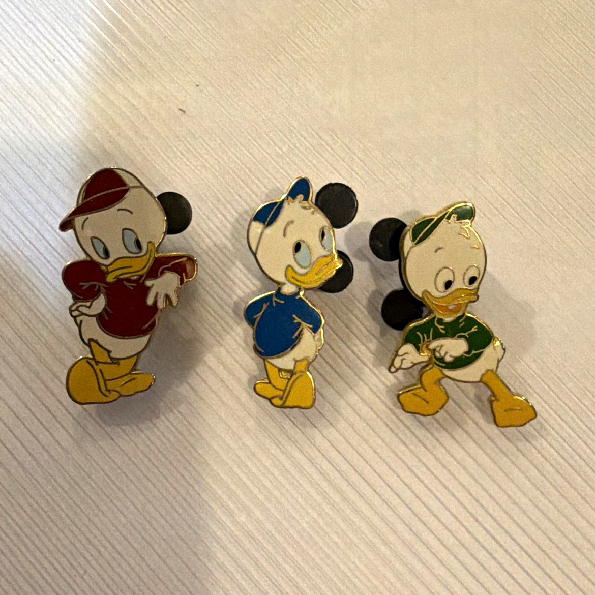 Disney Donald Duck Enamel Pin Set of 3 - Red, Blue & Green Outfits Disney Donald Duck Enamel Pin Set of 3 - Red, Blue & Green Outfits