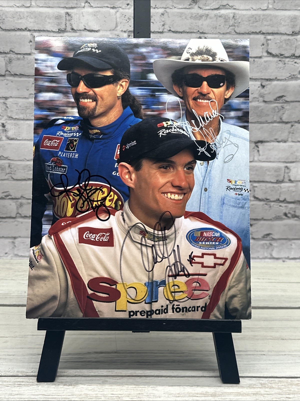 ADAM, RICHARD, KYLE PETTY SIGNED 1999 Hero Card Petty Enterprises GRAD AUTHENTIC ADAM, RICHARD, KYLE PETTY SIGNED 1999 Hero Card Petty Enterprises GRAD AUTHENTIC