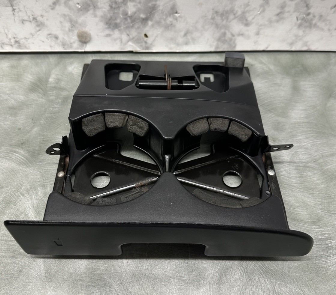 Read: 1994-1997 Dodge Ram Cup Holder Dash Pull Out Drink Holder Housing Only. Read: 1994-1997 Dodge Ram Cup Holder Dash Pull Out Drink Holder Housing Only.