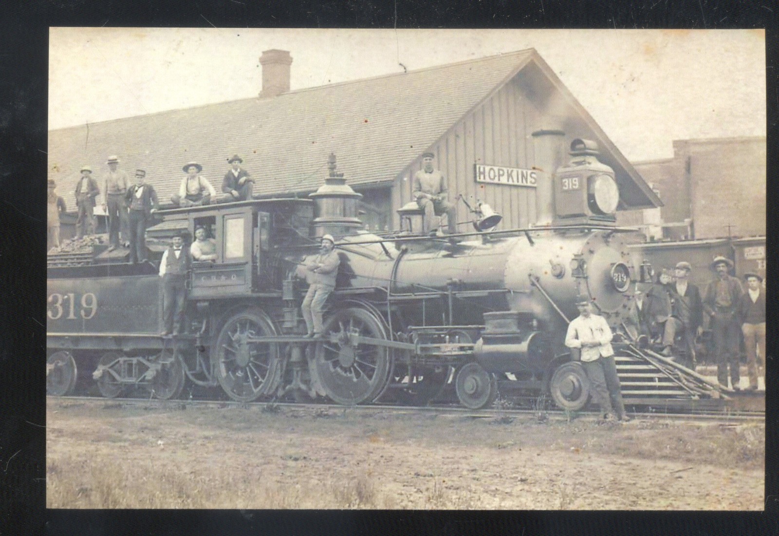 REAL PHOTO HOPKINS MISSOURI RAILROAD DEPOT TRAIN STATION MO. POSTCARD COPY REAL PHOTO HOPKINS MISSOURI RAILROAD DEPOT TRAIN STATION MO. POSTCARD COPY