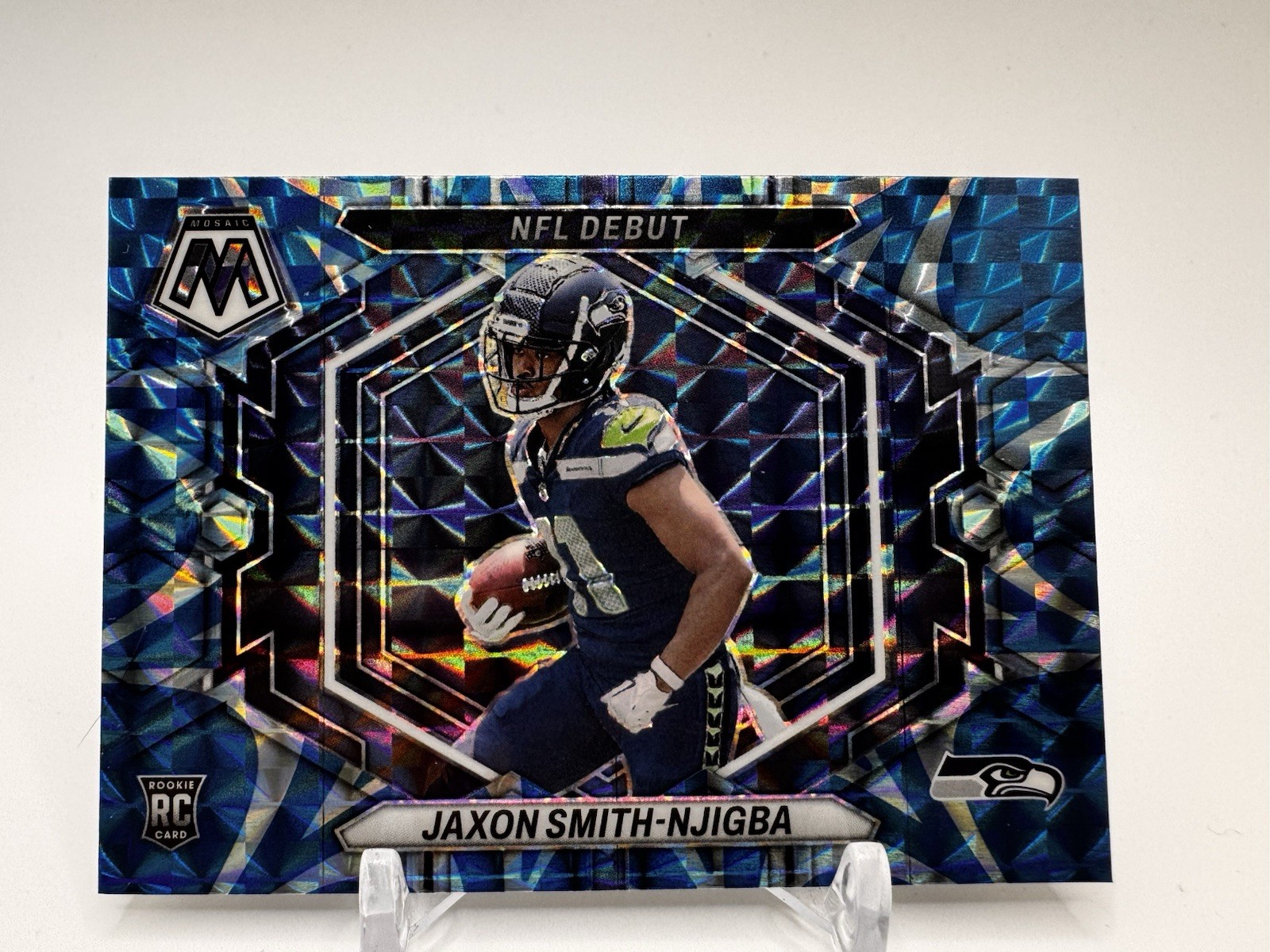 2023 Panini NFL Debut Jaxon Smith-Njigba #ND-12 Reactive Blue Mosaic Prizm (RC) 2023 Panini NFL Debut Jaxon Smith-Njigba #ND-12 Reactive Blue Mosaic Prizm (RC)