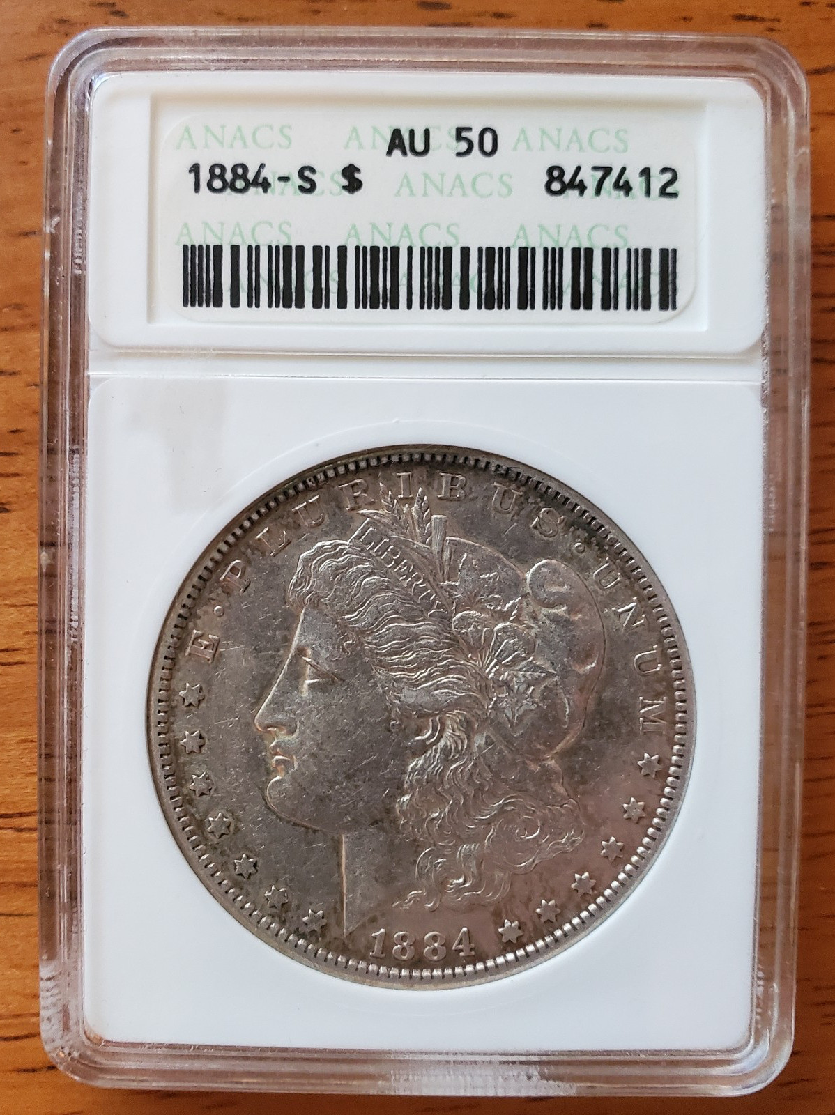 MORGAN DOLLAR 1884 S ANACS AU50 MORGAN DOLLAR 1884 S ANACS AU50
