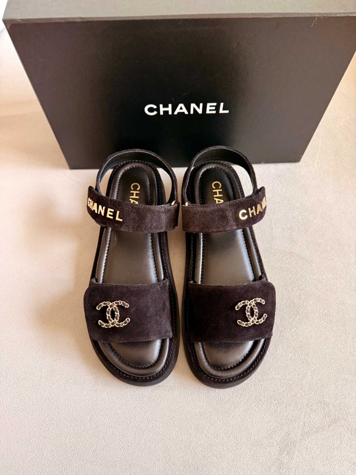 Chanel 25A Black Calfskin Suede Gold CC Logo Mule Slide Chanel 25A Black Calfskin Suede Gold CC Logo Mule Slide