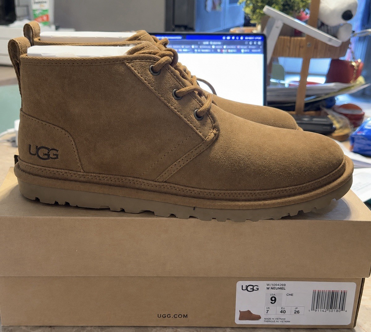 Brand new, never worn UGG Neumel boots in the classic chestnut/brown color. Brand new, never worn UGG Neumel boots in the classic chestnut/brown color.