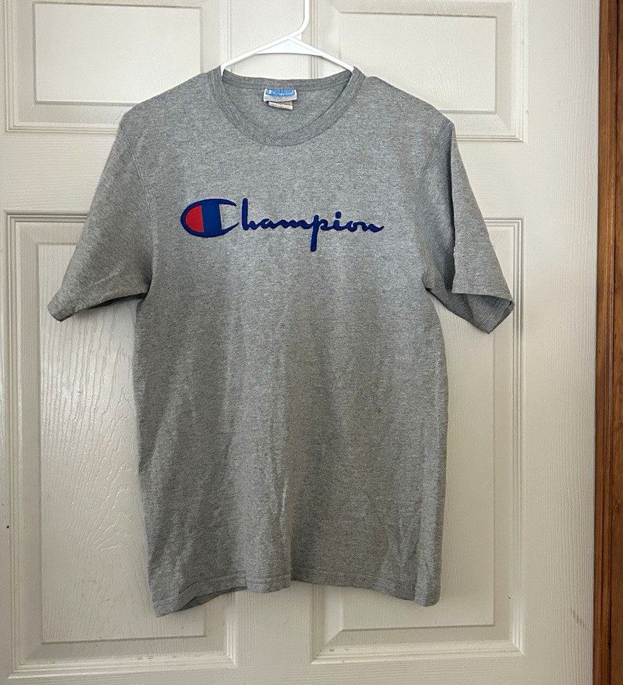 VTG 90s Champion embroidered Crew Neck Short Sleeve Tee, Size M, blue woven tag