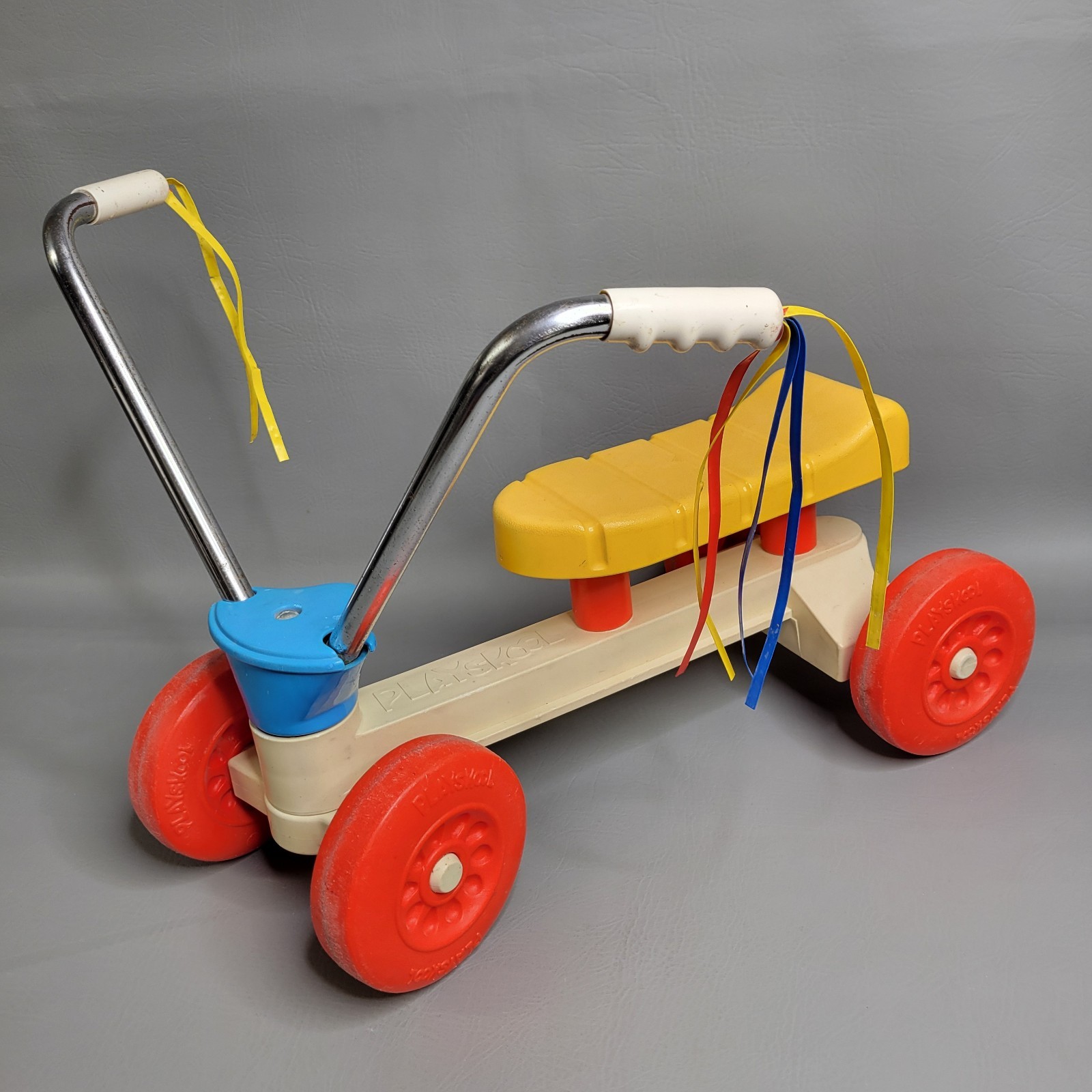 Vintage Playskool Wiggle Wagon Childs Ride On White Red Blue Yellow 4 Wheels