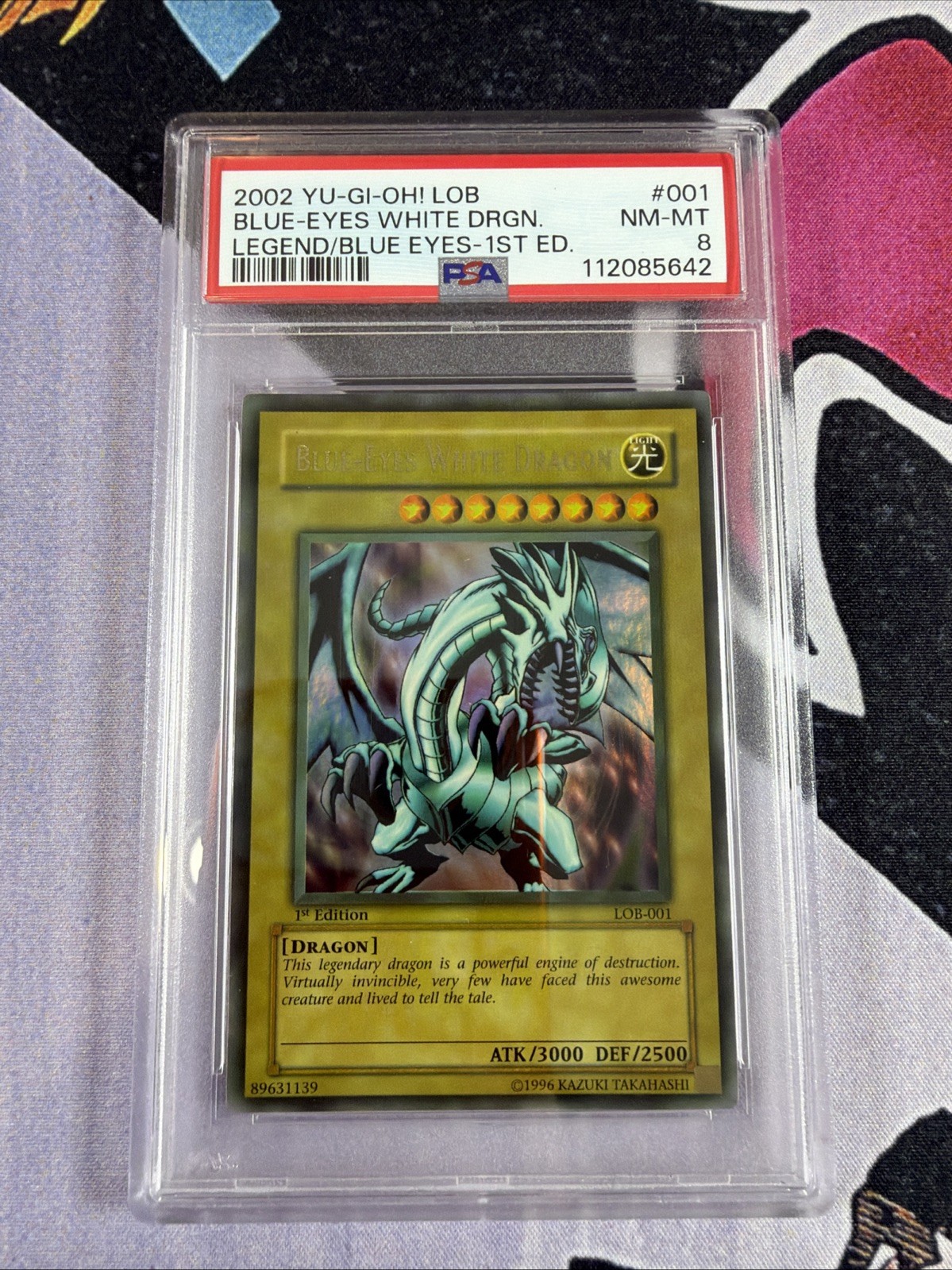 2002 YU-GI-OH  LOB-001 Blue-Eyes White Dragon 1st Edition PSA 8 FADED