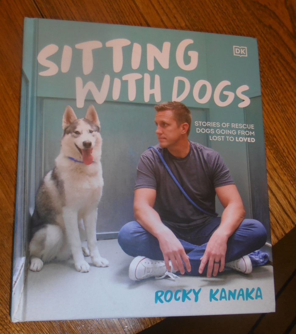 NEW- SITTING WITH DOGS: STORIES OF RESCUE DOGS LOST & LOVED. ROCKY KANAKA BOOK