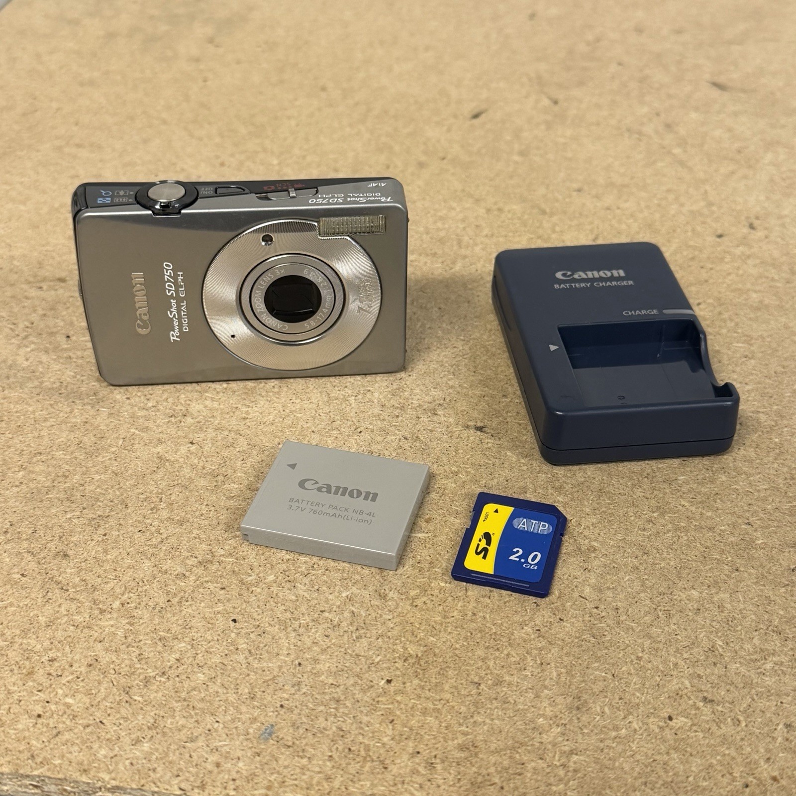Canon PowerShot SD750 Digital ELPH 7.1 MP Camera w/ Battery Charger 2GB SD Card