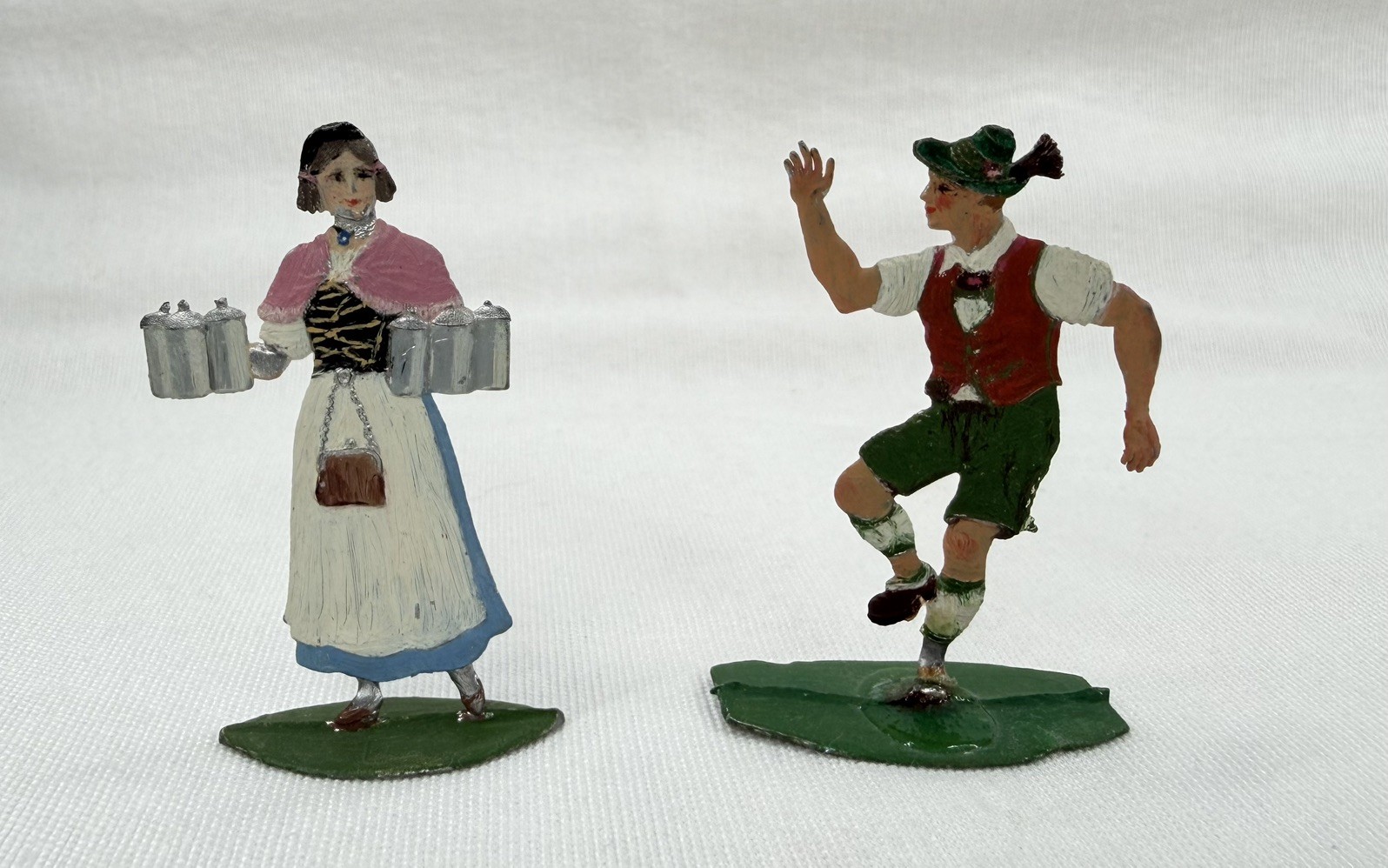Vintage German Bavarian Folk Dancers Metal Figurines Lederhosen Beer Steins Pair Vintage German Bavarian Folk Dancers Metal Figurines Lederhosen Beer Steins Pair