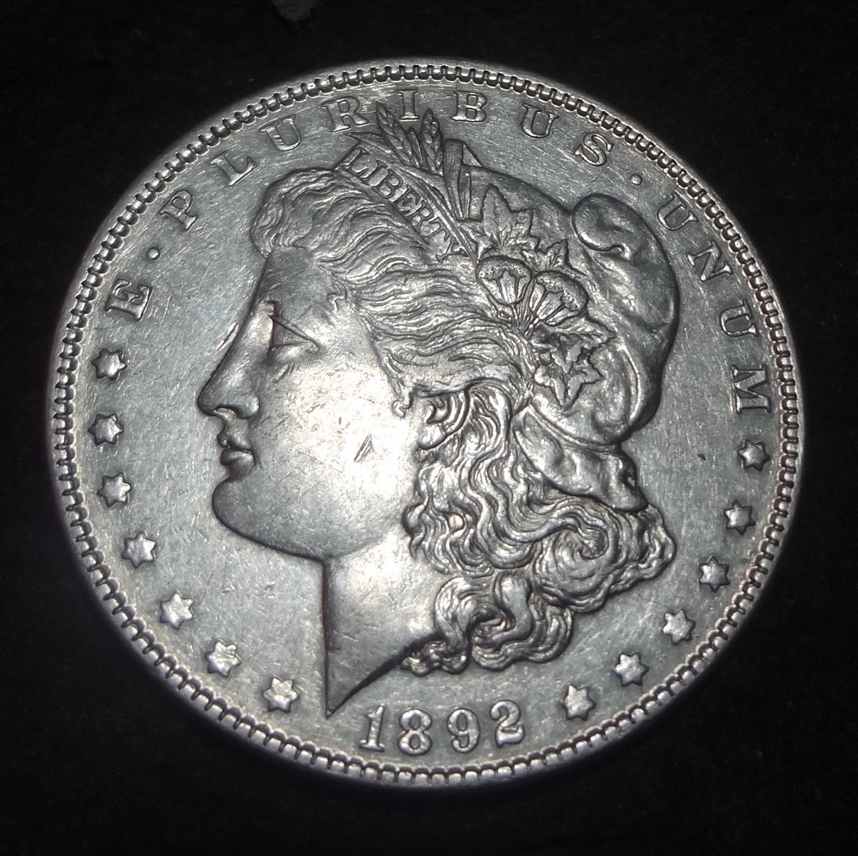 1892 P Morgan Silver Dollar - Solid AU details key from the Philadelphia mint