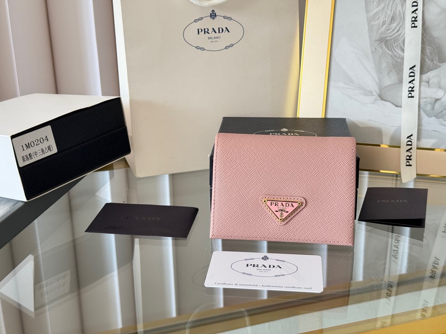 Prada small wallet/card holder, model 1M0204; dimensions: 11.2 x 9.5 cm.