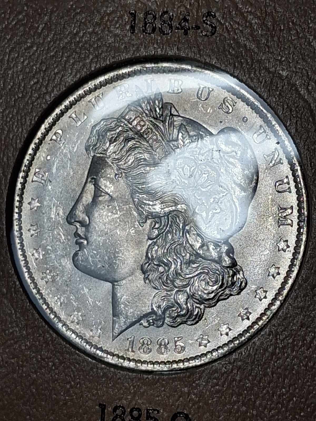 1885-O MORGAN SILVER DOLLAR. CHOICE GEM BRILLIANT UNCIRCULATED. 1885-O MORGAN SILVER DOLLAR. CHOICE GEM BRILLIANT UNCIRCULATED.
