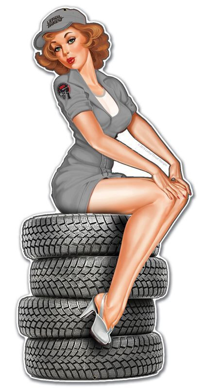 PINUP GIRL SITTING ON CAR TIRES 24\