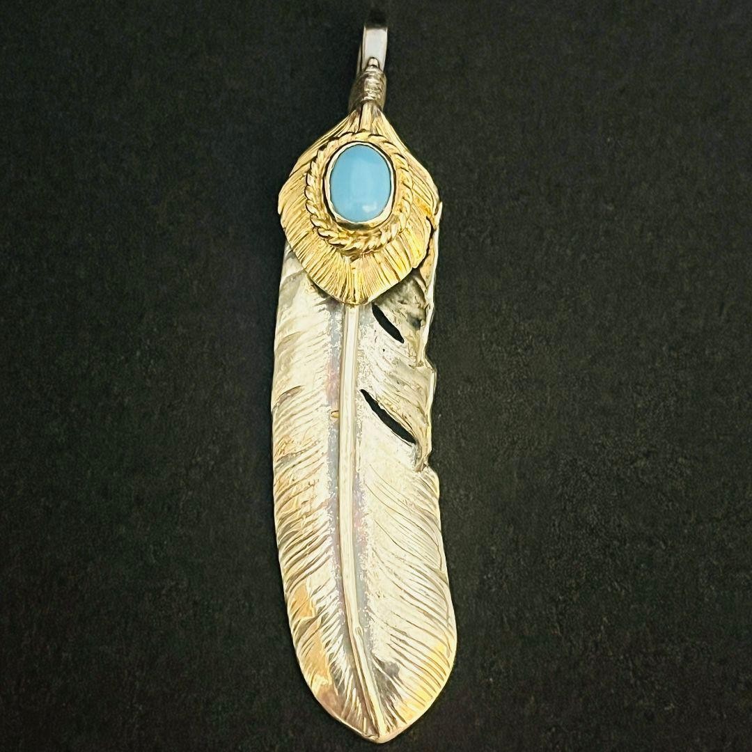 Goro's Large Gold Rope Turquoise Feather