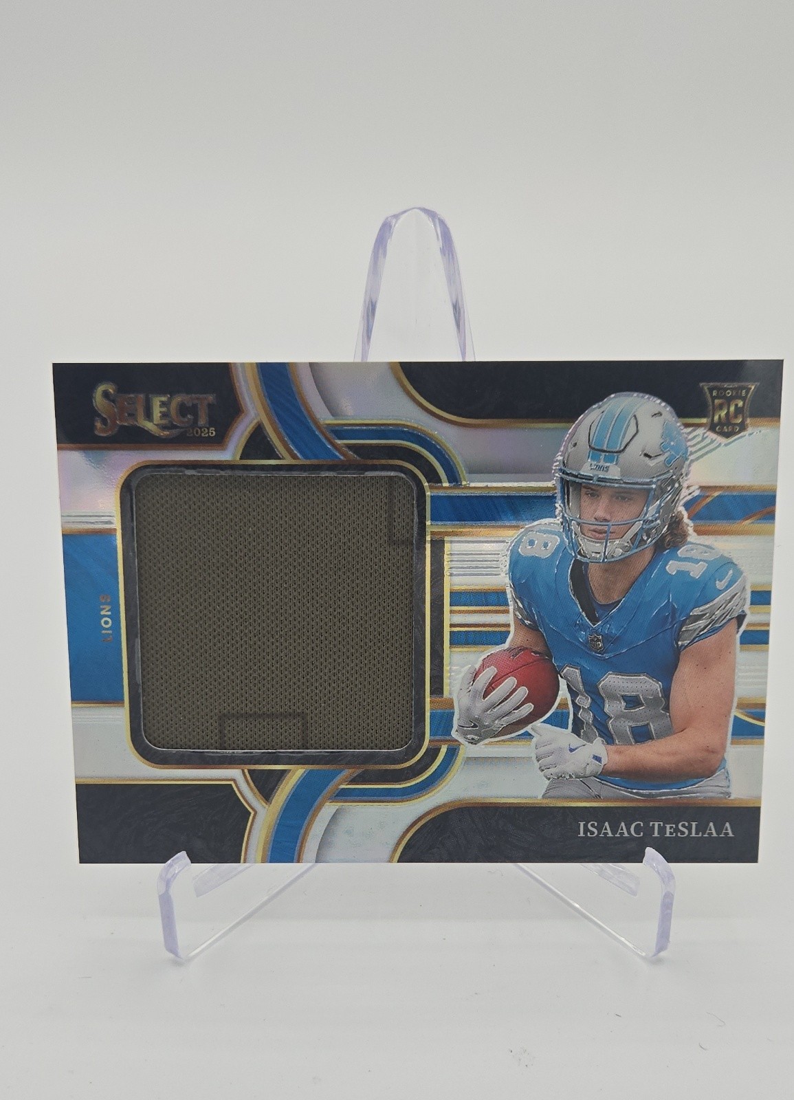 2025 Panini Select - Jumbo Rookie Swatches Isaac Teslaa #JRSW-ITA /149 (MEM, RC)
