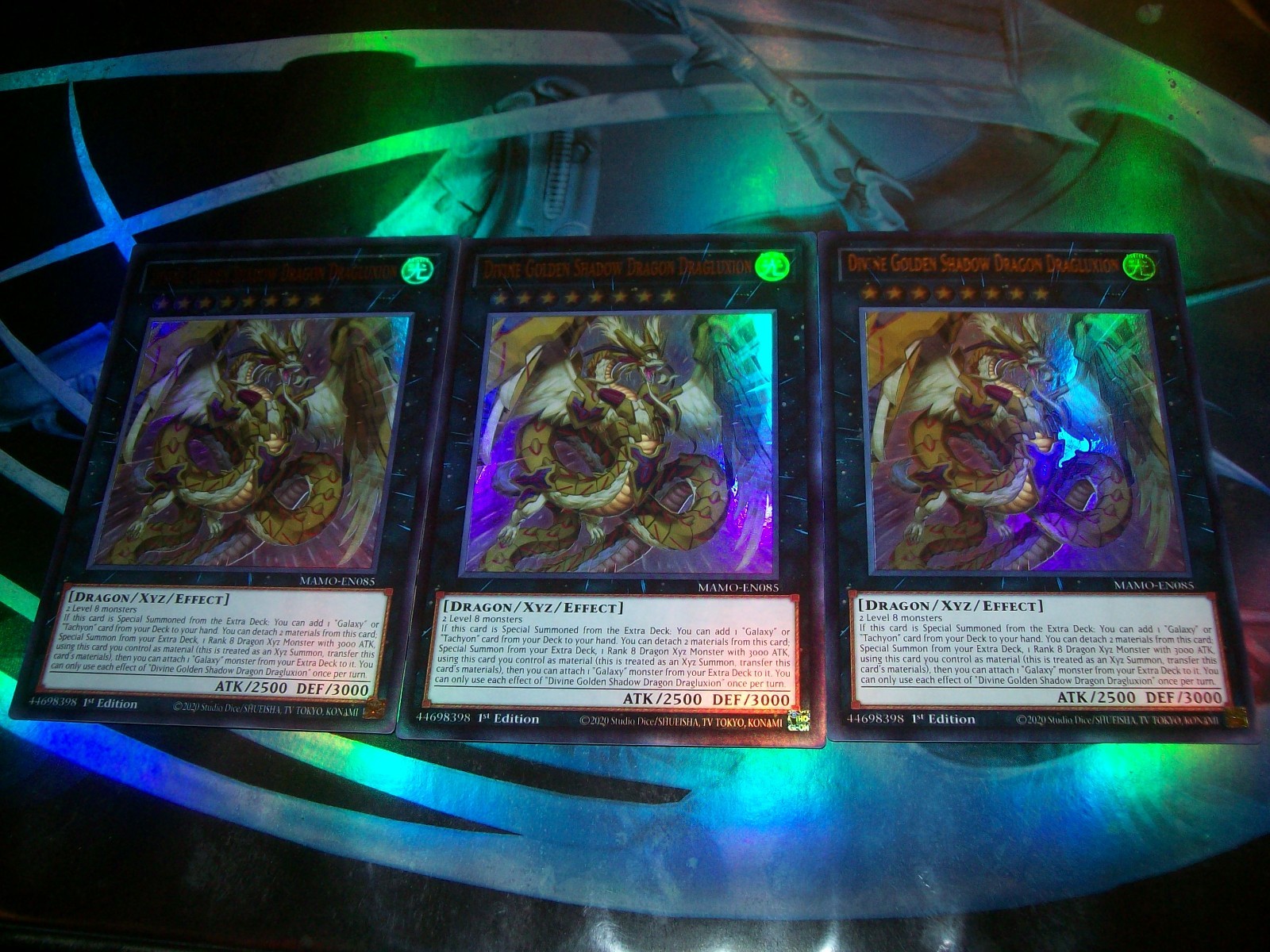 3x Divine Golden Shadow Dragon Dragluxion 1st Edition Ultra Rare MAMO-EN085 3x Divine Golden Shadow Dragon Dragluxion 1st Edition Ultra Rare MAMO-EN085