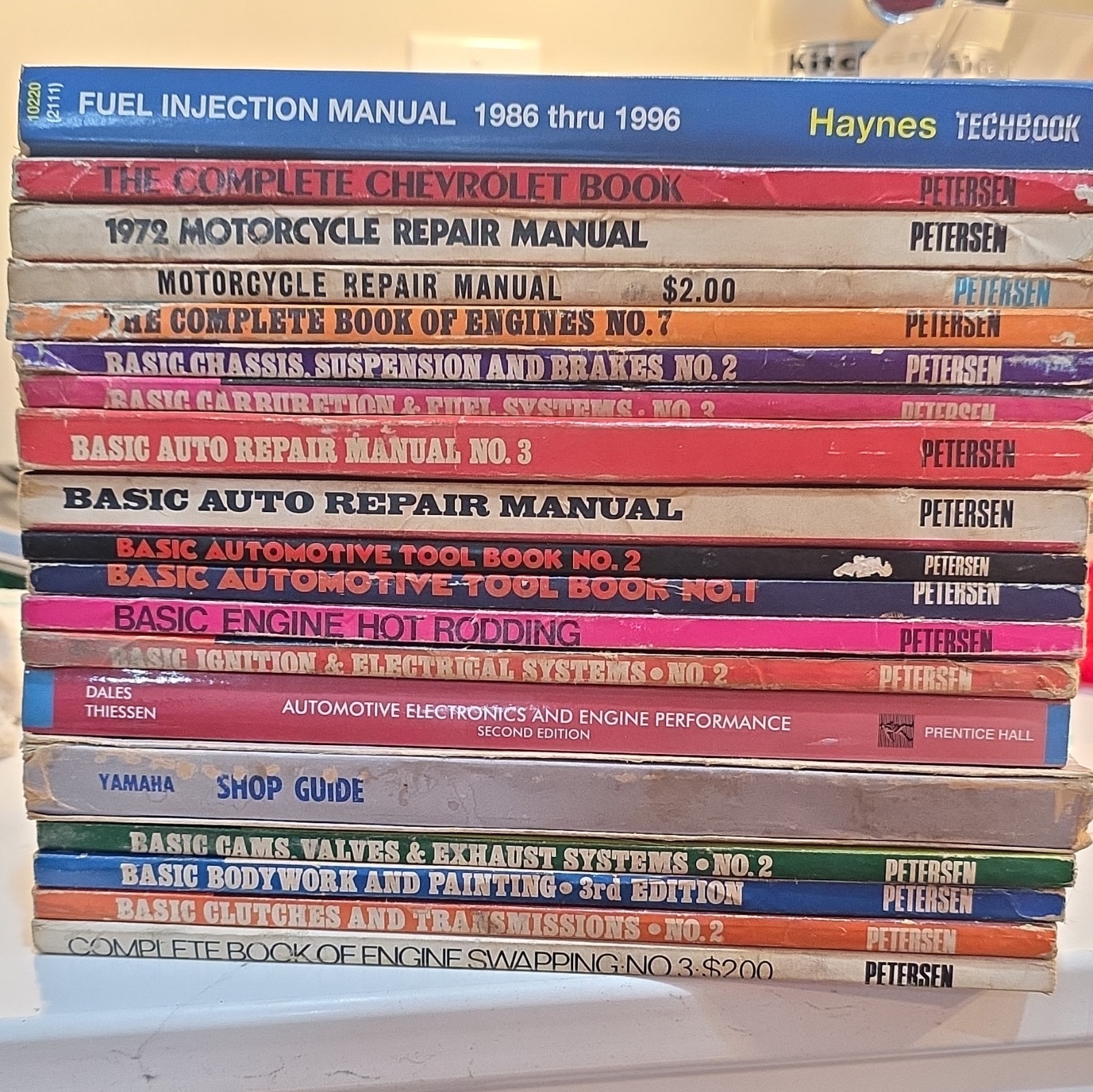 Peterson Automotive Books and Assorted Manuals  Complete Book of Engine Swapping