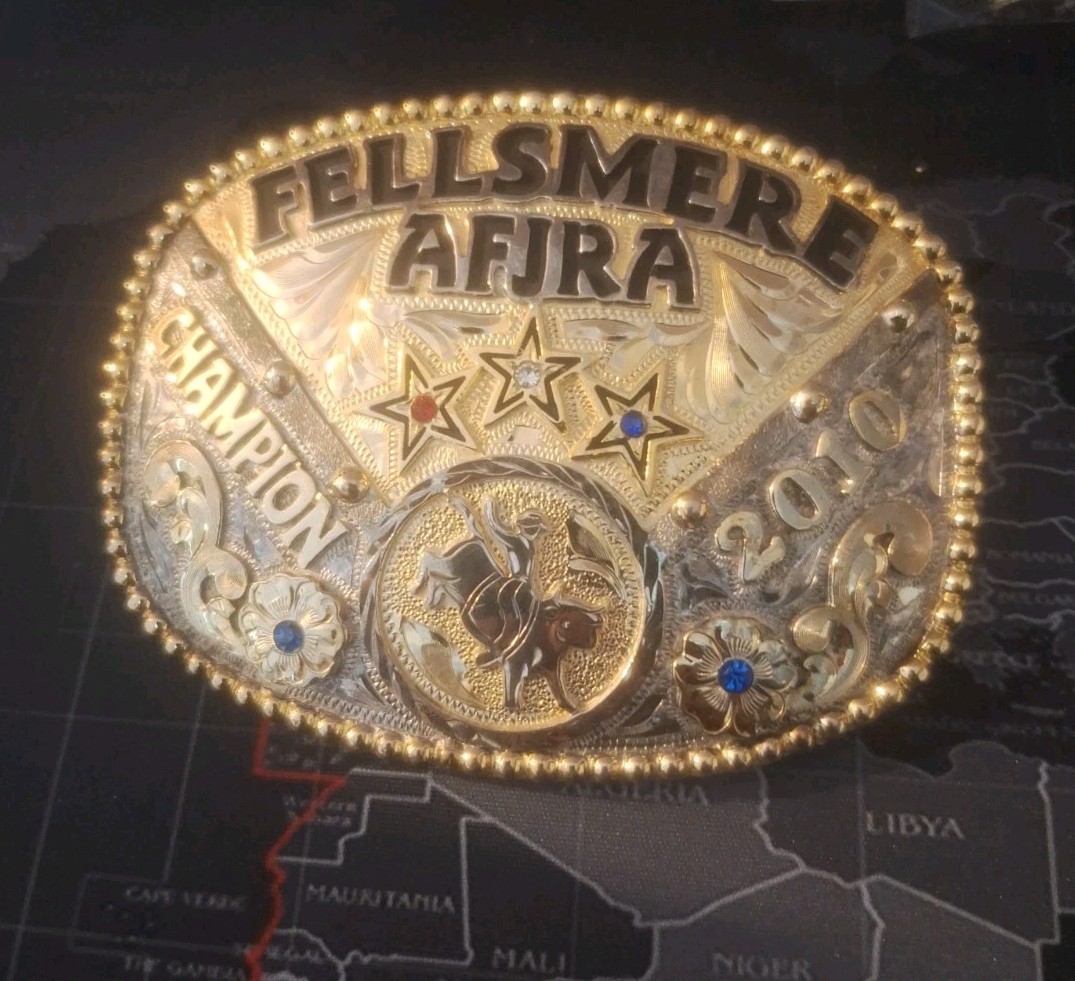 2010 LARG AFJRA RODEO TROPHY BUCKLE CHAMPION COWBOY, TRES RIOS SILVER 2010 LARG AFJRA RODEO TROPHY BUCKLE CHAMPION COWBOY, TRES RIOS SILVER