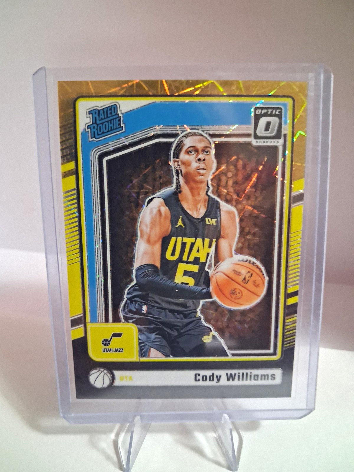 Panini 2024-25 Rated Rookies Cody Williams Jazz Black & Gold Velocity #298 /8