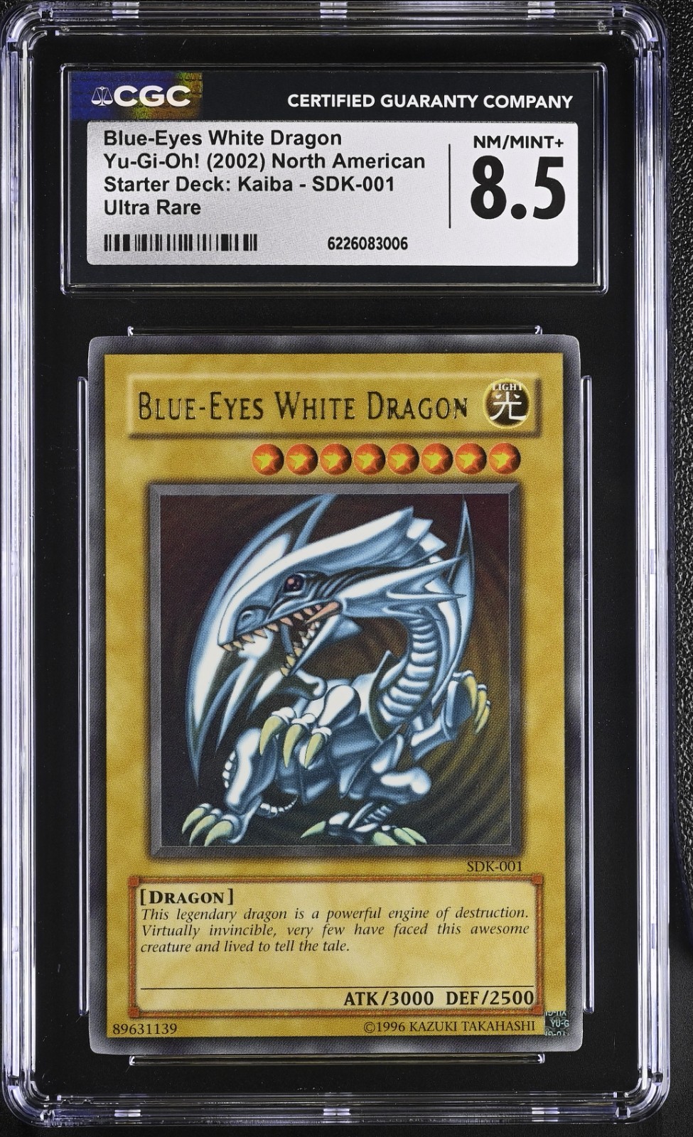 2002 Yu-Gi-Oh Blue-Eyes White Dragon SDK-001 Ultra Rare CGC 8.5 Vintage