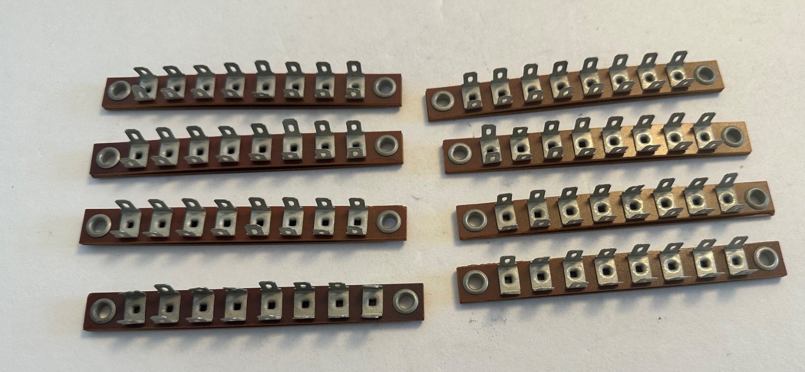 8 Lug Common Phenolic Terminal Strip (QTY 8) Slide connector or solder 8 Lug Common Phenolic Terminal Strip (QTY 8) Slide connector or solder
