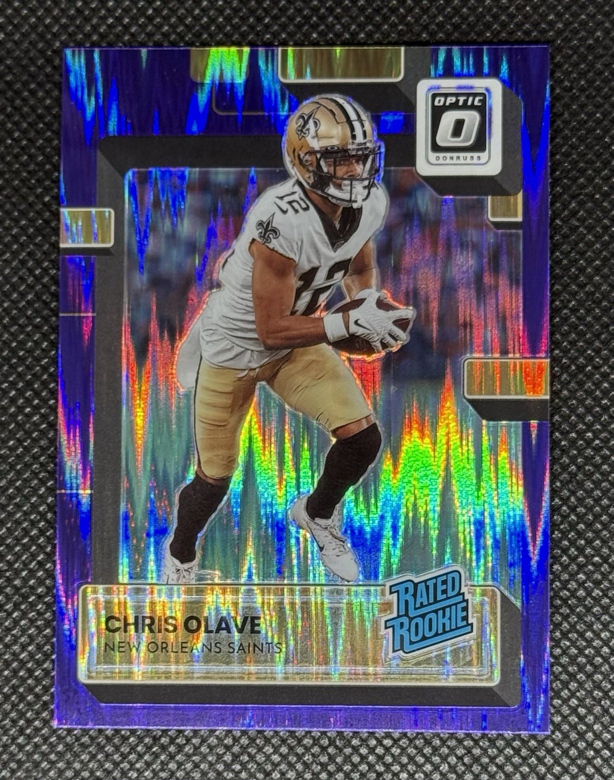 2022 Panini Donruss Optic #209 Chris Olave Rated Rookie Purple Shock RC Saints 2022 Panini Donruss Optic #209 Chris Olave Rated Rookie Purple Shock RC Saints