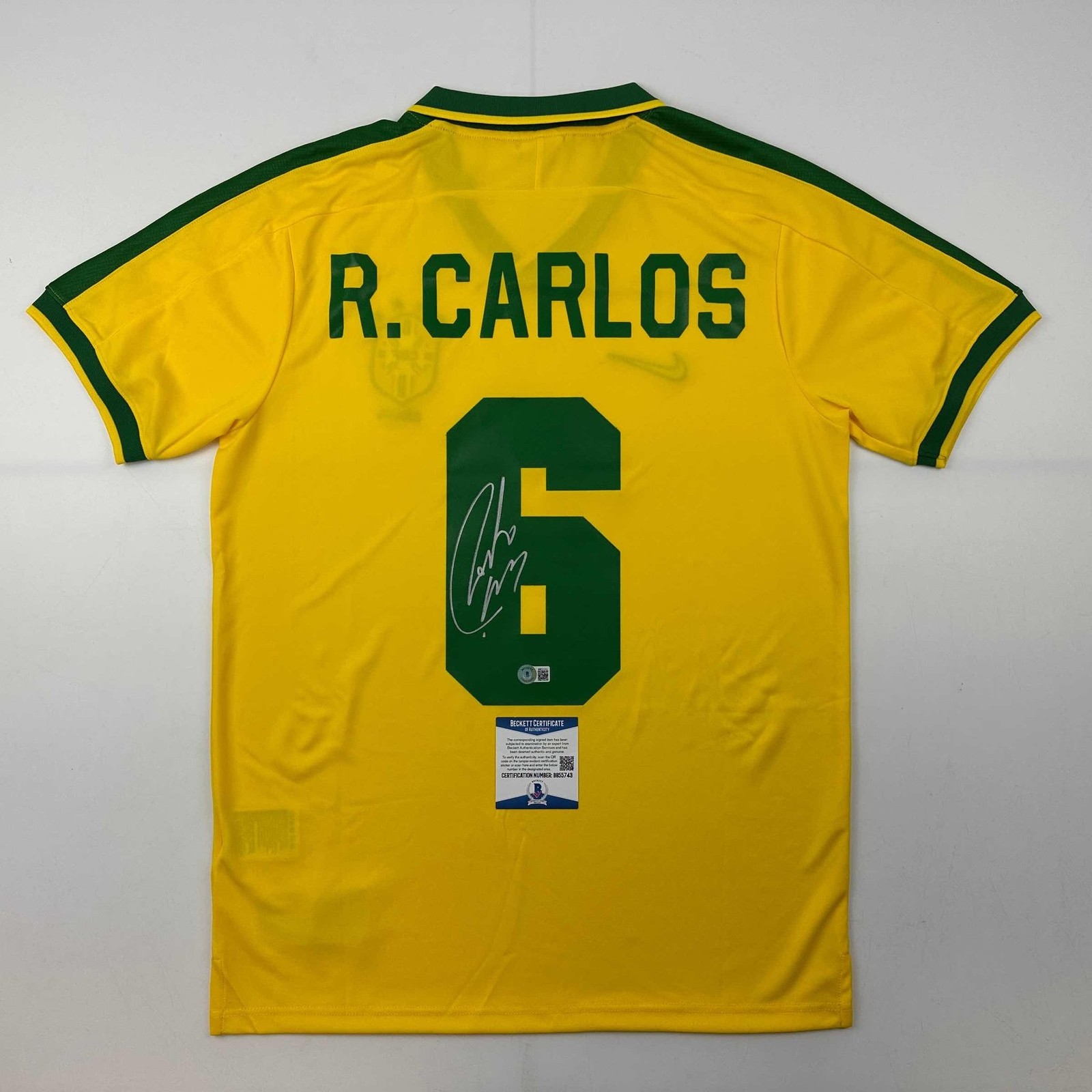 Autographed/Signed Roberto Carlos Brazil Yellow Retro Jersey Beckett COA Autographed/Signed Roberto Carlos Brazil Yellow Retro Jersey Beckett COA