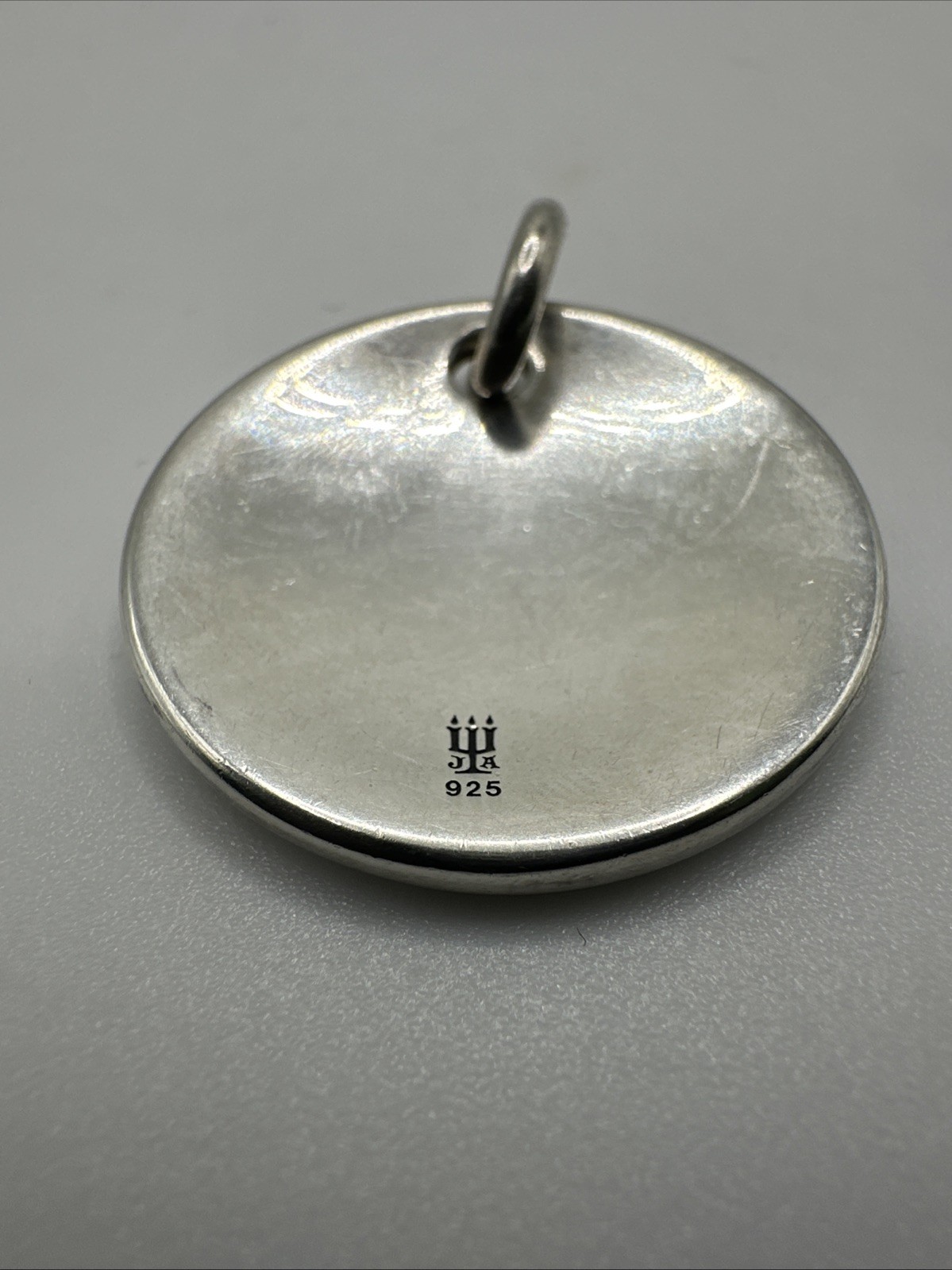 Retired James Avery round disc pendant engraved “Trust & Be Fearless” 17.5g