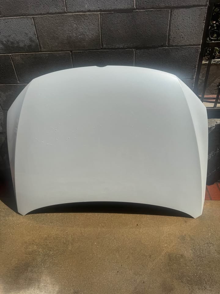 2011-2018 Volkswagen Jetta white hood oem original The OEM hood from a 2011-2018