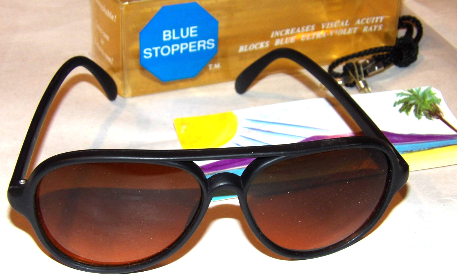 VINTAGE 1980s UNUSED BLUE STOPPERS/BLOCKERS SUNGLASSES~AVIATOR STYLE/BLACK NYLON